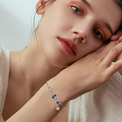 Mira Glow - Schmetterlingsarmband mit blauer Cubic Zirkonia - Alyrah Jewellery