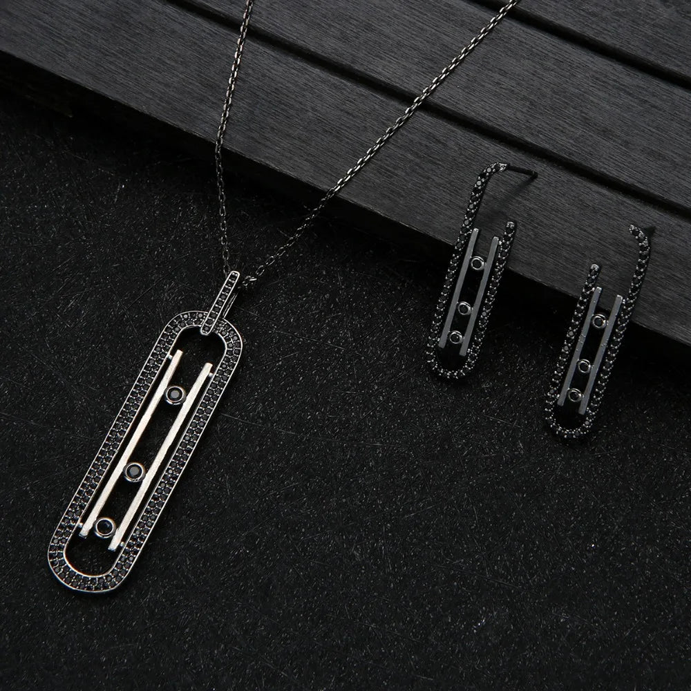 Luxury Geometry – Schichtbares Schmuckset: Anhänger, Ohrringe & Ring