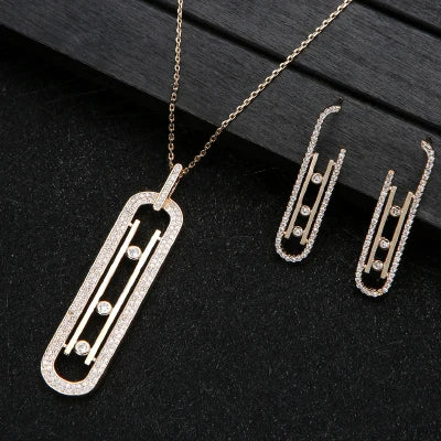 Luxury Geometry – Schichtbares Schmuckset: Anhänger, Ohrringe & Ring