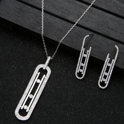 Luxury Geometry – Schichtbares Schmuckset: Anhänger, Ohrringe & Ring